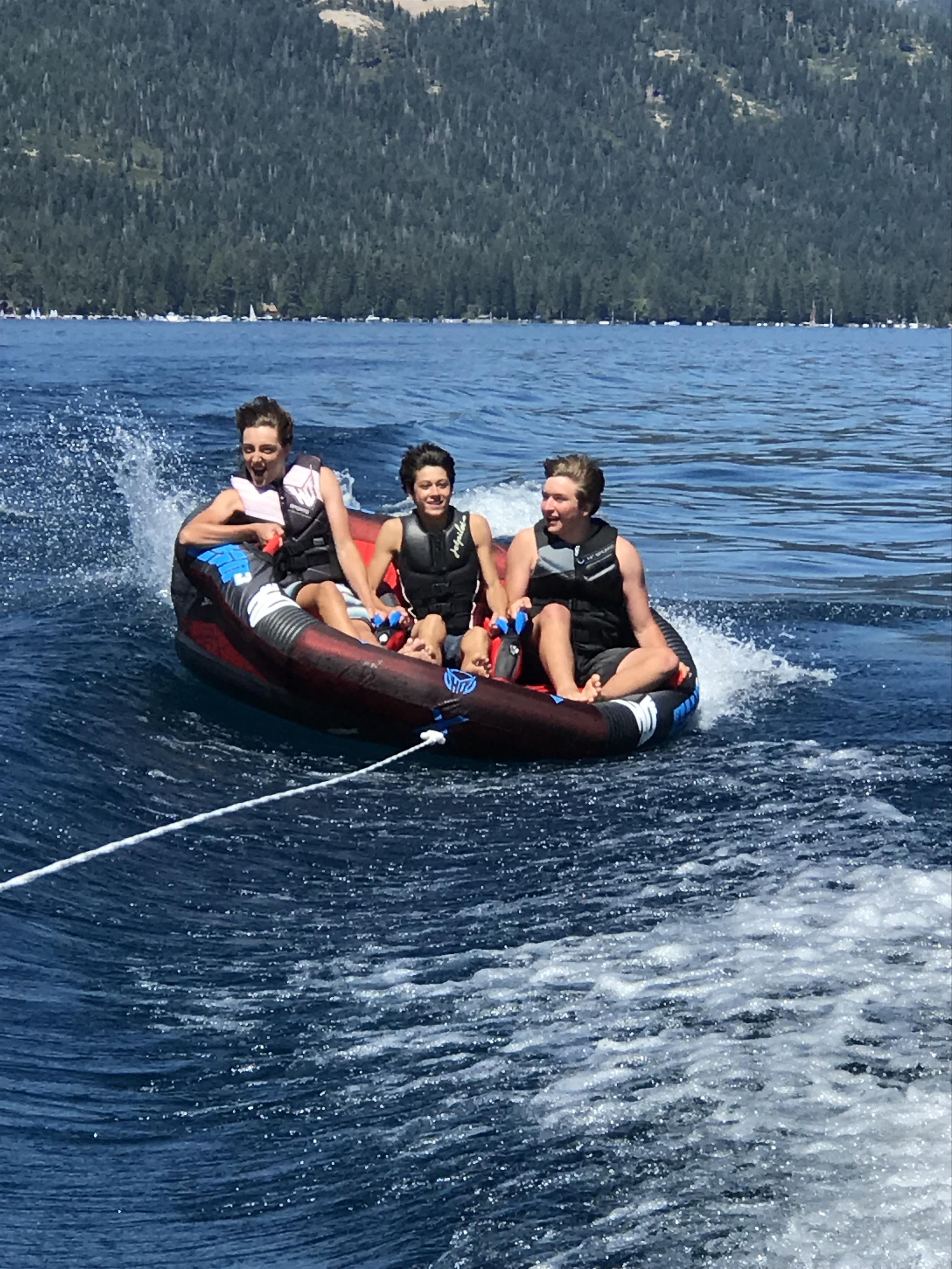 people tubing in the water